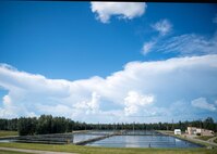 U.S. Air Force Airman 1st Class Troy Moncrief, a 354th Civil Engineering Squadron wastewater apprentice, uses a boat to inspect aeration equipment in ponds at the Eielson Air Force Base, Alaska, wastewater treatment plant July 15, 2016. The manufactured holding pond lined with thick black plastic hold millions of gallons of waste that is treated in a week’s time after it enters the plant. (U.S. Air Force photo by Staff Sgt. Shawn Nickel)
