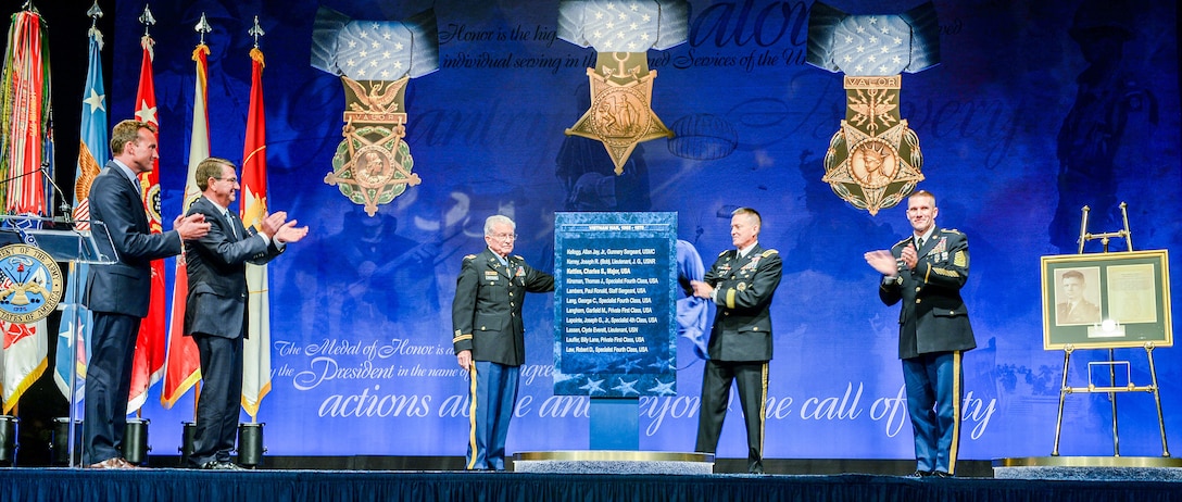 Defense Secretary Ash Carter claps during the Hall of Heroes induction ceremony for retired Army Lt. Col. Charles Kettles at the Pentagon, July 19, 2016. Kettles received the Medal of Honor for his heroic actions in the Vietnam War during a White House ceremony, July 18, 2016. DoD photo by Army Sgt. First Class Clydell Kinchen