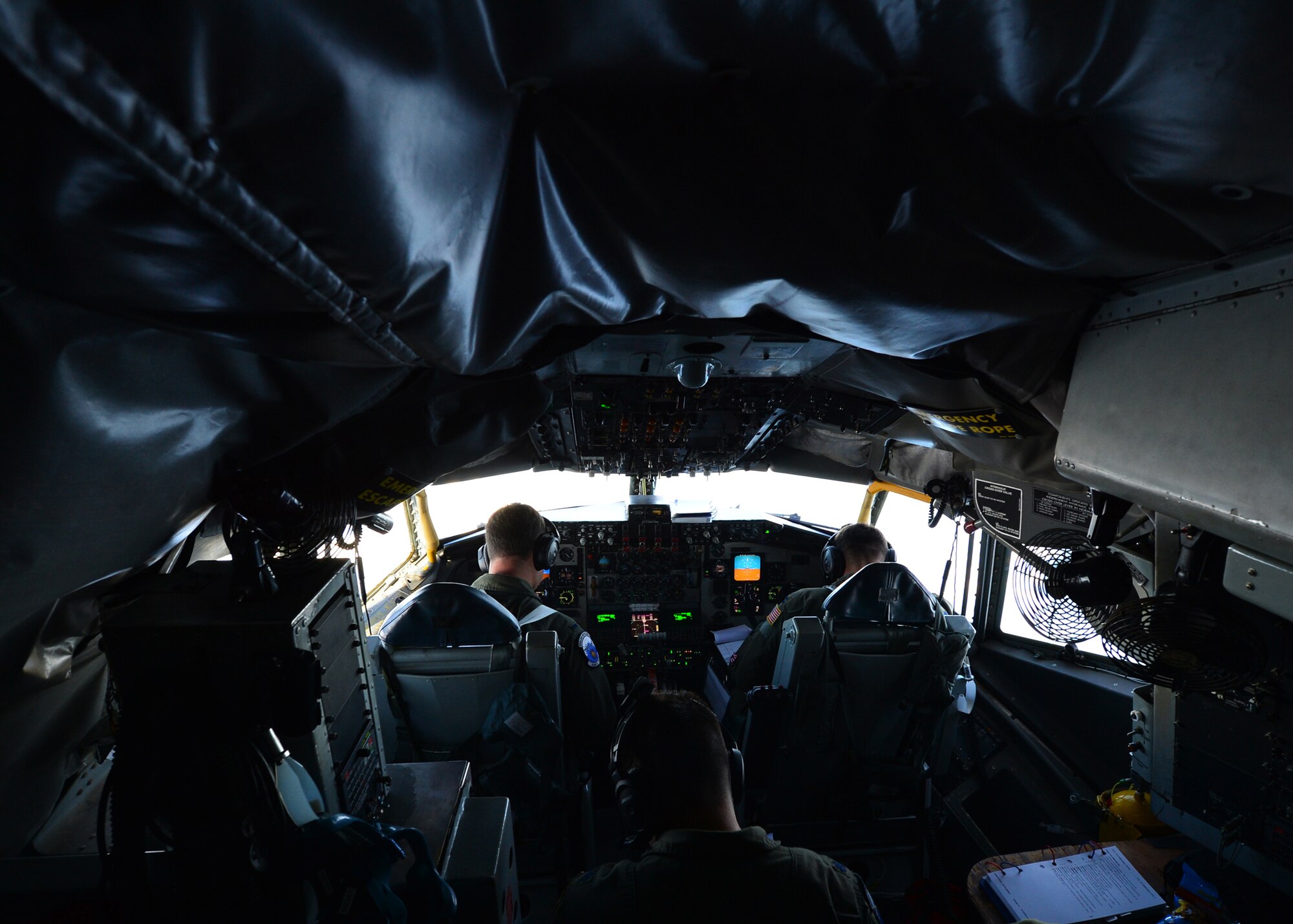 Aircrew from the 909th Aircraft Refueling Squadron, Kadena Air Base, Japan, prepare to land a KC-135 Stratotanker during the Rim of the Pacific Exercise on Joint Base Pearl Harbor-Hickam, July 14, 2016. The exercises has a total of 49 ships, six submarines, 200 aircraft, and 25,000 personnel participating. RIMPAC is the world’s largest international maritime exercise, providing a unique training opportunity while fostering and sustaining cooperative relationships between participants critical to ensuring the safety of sea lanes and security on the world’s oceans. RIMPAC 2016 is the 25th exercise in the series that began in 1971. (U.S. Air Force photo by Tech. Sgt. Aaron Oelrich/Released)