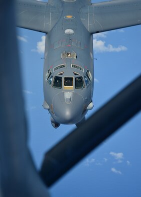 A B-52H Stratofortress from the 69th Bomb Squadron, Minot Air Force Base, N.D., prepares to receive fuel from a KC-135 Stratotanker, over the Pacific Ocean during an international sinking exercise for Rim of the Pacific 2016 near Joint Base Pearl Harbor-Hickam, July 14, 2016. Twenty-six nations, more than 40 ships and submarines, more than 200 aircraft, and 25,000 personnel are participating in RIMPAC from June 30 to Aug. 4 in and around the Hawaiian Islands and Southern California. The world's largest international maritime exercise, RIMPAC, provides a unique training opportunity that helps participants foster and sustain the cooperative relationships that are critical to ensuring the safety of sea lanes and security on the world's oceans. RIMPAC 2016 is the 25th exercise in the series that began in 1971. (U.S. Air Force photo by Tech. Sgt. Aaron Oelrich/Released)

