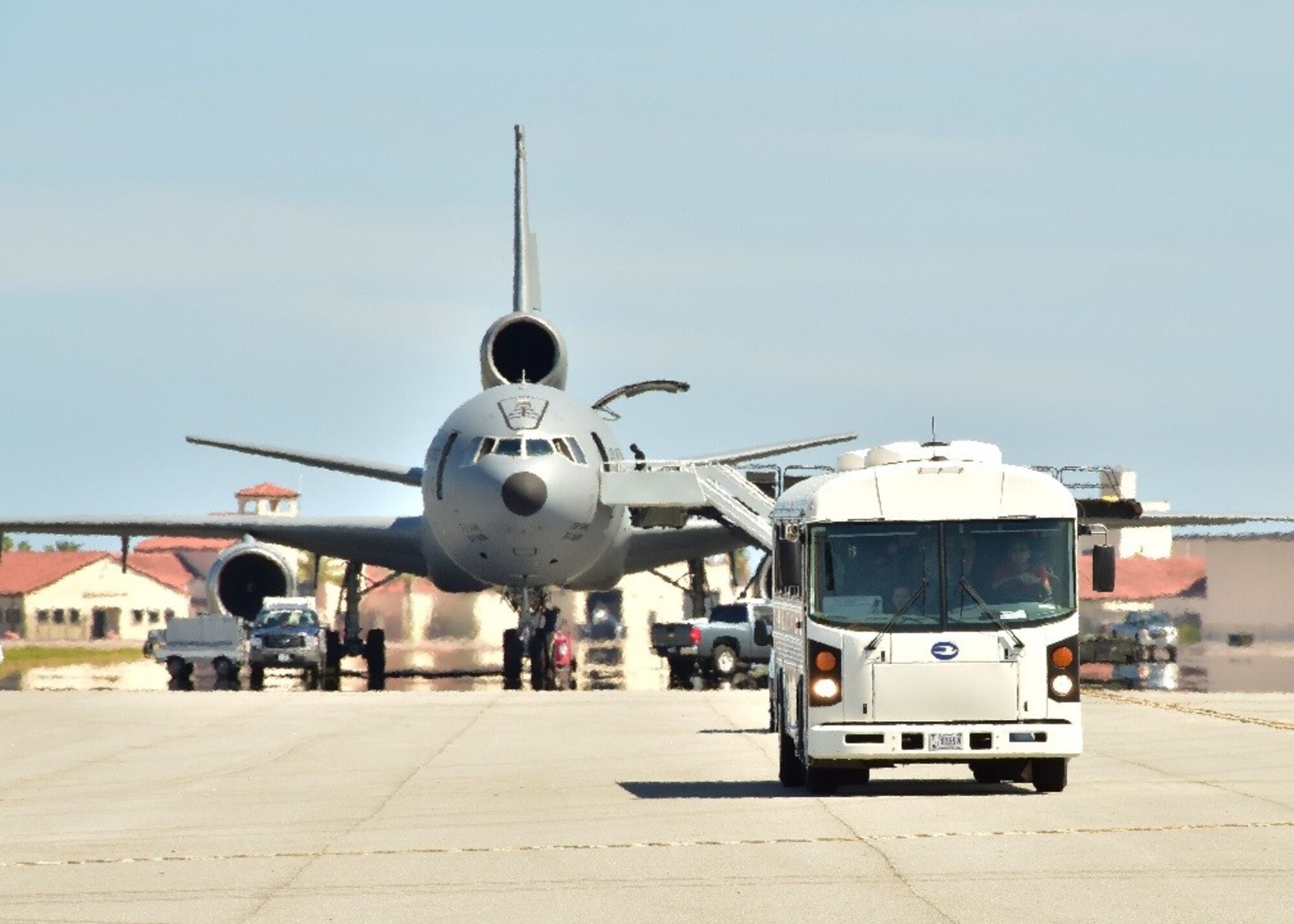 A bus carrying 924th Fighter Group Airmen from Davis-Monthan Air Force Base, Arizona from a KC-10 to the 301st Rescue Squadron to begin their annual tour July 15 on Patrick Air Force Base, Fla. Approximately 200 Airmen from the 924th will conduct their annual tour at Patrick AFB, allowing the unit to gain experience and train with the 920th Rescue Wing. (U.S. Air Force photo by Tech. Sgt. Louis Vega Jr.)