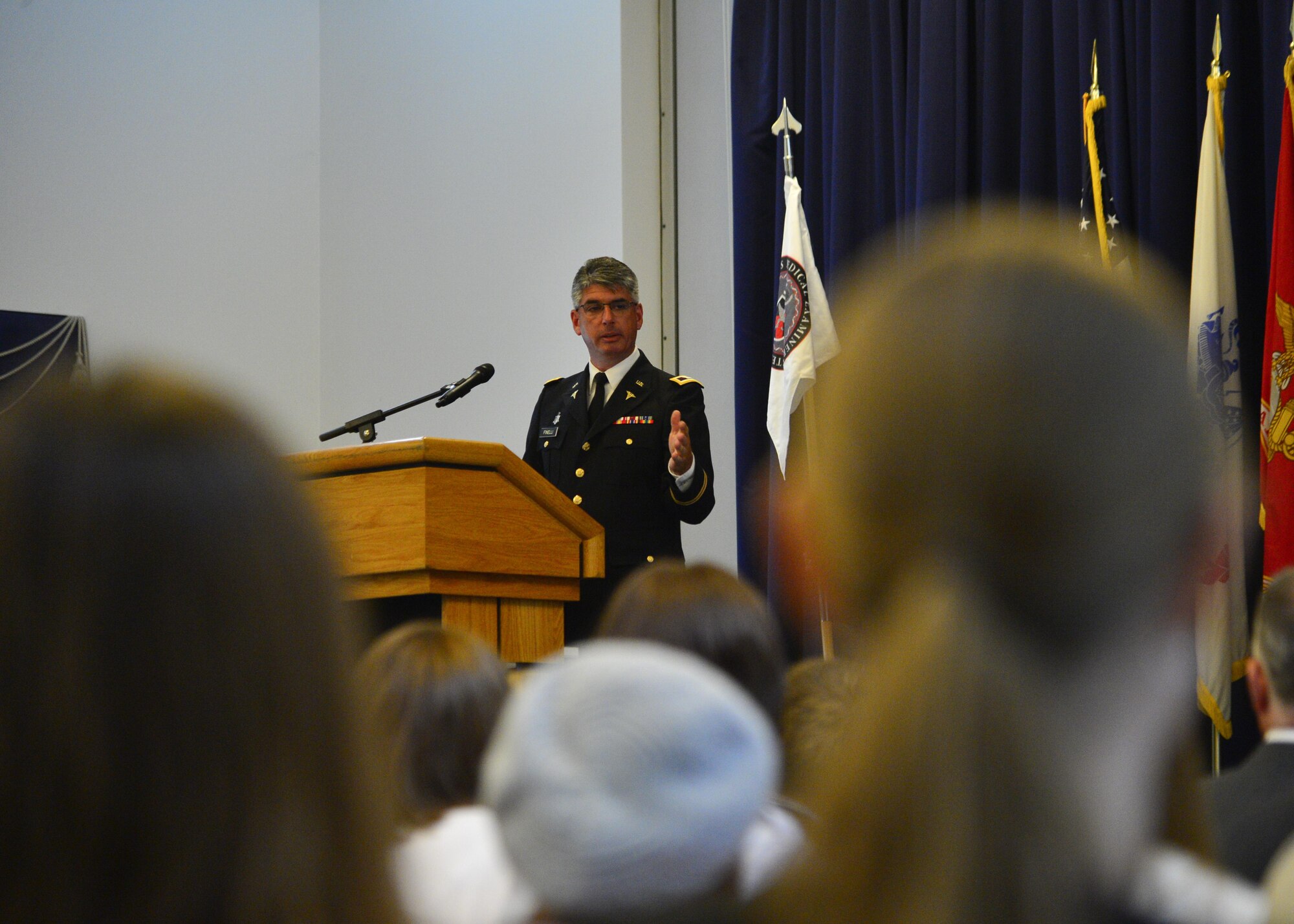 Army Col. Louis Finelli, Armed Forces Medical Examiner System director, speaks at a Change of Directorship Ceremony July 18, 2016, at the Landings on Dover Air Force Base, Del. Finelli assumed directorship of AFMES from Army Col. Ladd Tremaine during the ceremony officiated by Navy Rear Adm. Colin Chinn, Defense Health Agency director of research, development and acquisition. (U.S. Air Force photo/Senior Airman William Johnson)