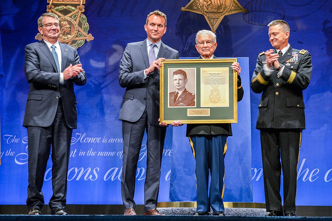 Defense Secretary Ash Carter, left, Army Secretary Eric Fanning, second left, and Army Vice Chief of staff Gen. Daniel B. Allyn, right, applaud as Medal of Honor recipient retired Army Lt. Col. Charles Kettles joins the Pentagon's Hall of Heroes, July 19, 2016. DoD photo by U.S. Army Sgt. First Class Clydell Kinchen