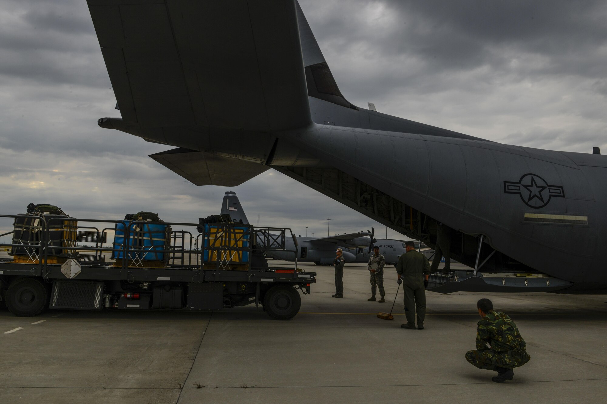 Senior Airman Emily Mitchell, 37th Airlift Squadron loadmaster prepares a C-130J Super Hercules before flight during Exercise Thracian Summer 2016 July 17, Plovdiv, Bulgaria. During the two-week forward training deployment, the 37th Airlift Squadron are conducting tactical flight training which include low-level flights, airdrop training with partnered forces and other related training events. The evolutions help preserve joint readiness, build interoperability and strengthen relationships with our NATO allies. (U.S. Air Force photo/Senior Airman Nicole Keim) 