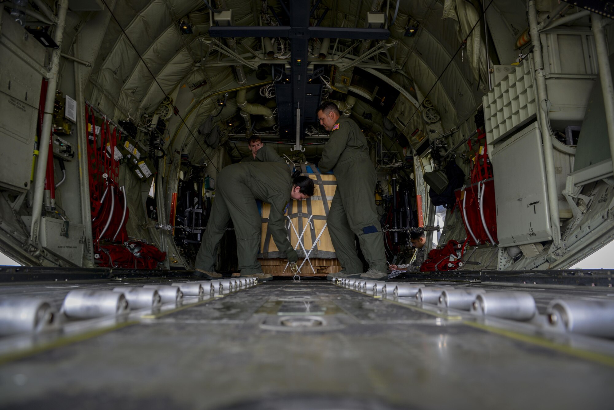 Senior Airman Emily Mitchell, 37th Airlift Squadron loadmaster prepares a C-130J Super Hercules before flight during Exercise Thracian Summer 2016 July 17, Plovdiv, Bulgaria. During the two-week forward training deployment, the 37th Airlift Squadron are conducting tactical flight training which include low-level flights, airdrop training with partnered forces and other related training events. The evolutions help preserve joint readiness, build interoperability and strengthen relationships with our NATO allies. (U.S. Air Force photo/Senior Airman Nicole Keim) 