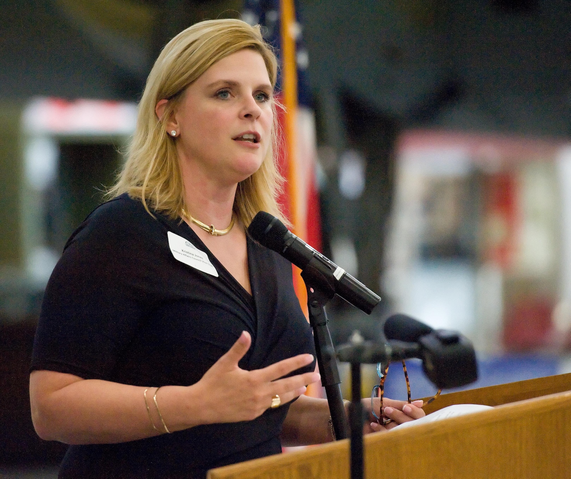 Kristina Jones, Abilene Chamber of Commerce vice-chair of the Military Affairs Committee, addresses attendees during the 2015 Abilene Trophy presentation ceremony July 13, 2016, at the Air Mobility Command Museum on Dover Air Force Base, Del. Representatives of the 436th and 512th Airlift Wings, Air Force Mortuary Affairs Operations, Abilene Chamber of Commerce, Central Delaware Chamber of Commerce, Dover AFB honorary commanders, civic leaders and congressional delegate representatives attended the trophy presentation. (U.S. Air Force photo/Roland Balik)