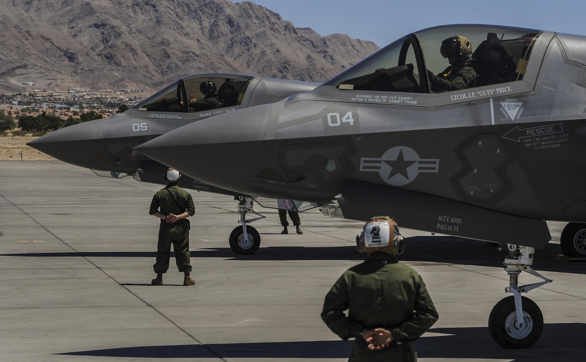 Marine F-35B aircrew members, assigned to the 3rd Marine Aircraft Wing, Marine Corps Air Station Yuma, Az., perform pre-flight checks and participate in Red Flag 16-3 at Nellis Air Force Base, Nev., July 12, 2016. Since its establishment in 1975, Red Flag has played host to military units from more than 30 countries to participate in high-end flight integration. (U.S. Air Force photo by Airman 1st Class Kevin Tanenbaum)