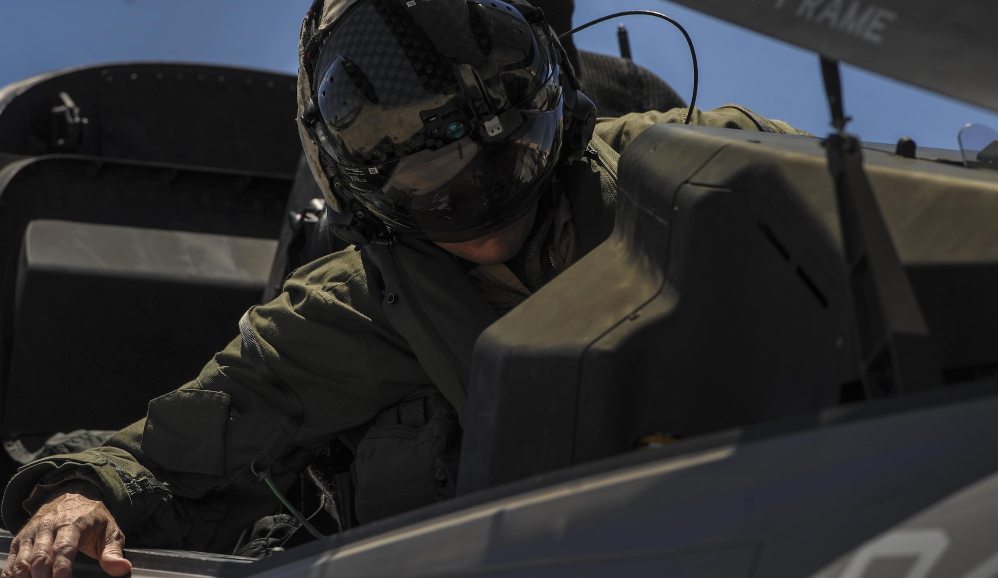 A Marine F-35B pilot, assigned to the 3rd Marine Aircraft Wing, Marine Corps Air Station Yuma, Az., preforms pre-flight inspections to his aircraft before take-off during Red Flag 16-3 at Nellis Air Force Base, Nev., July 12, 2016. Red Flag missions are conducted on the 2.9 million acres Nevada Test and Training Range with 1,900 possible targets, realistic threat systems and opposing enemy forces. (U.S. Air Force photo by Airman 1st Class Kevin Tanenbaum)