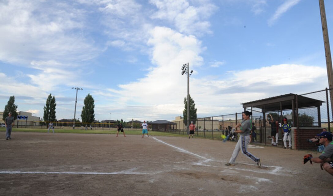 Staff Sgt. Stephanie George, 92nd Comptroller Squadron NCO in charge of military pay, gets a hit during the all-star softball game at Fairchild Air Force Base, Wash., July 18, 2016. The Blue Team defeated the Red Team 12-10.