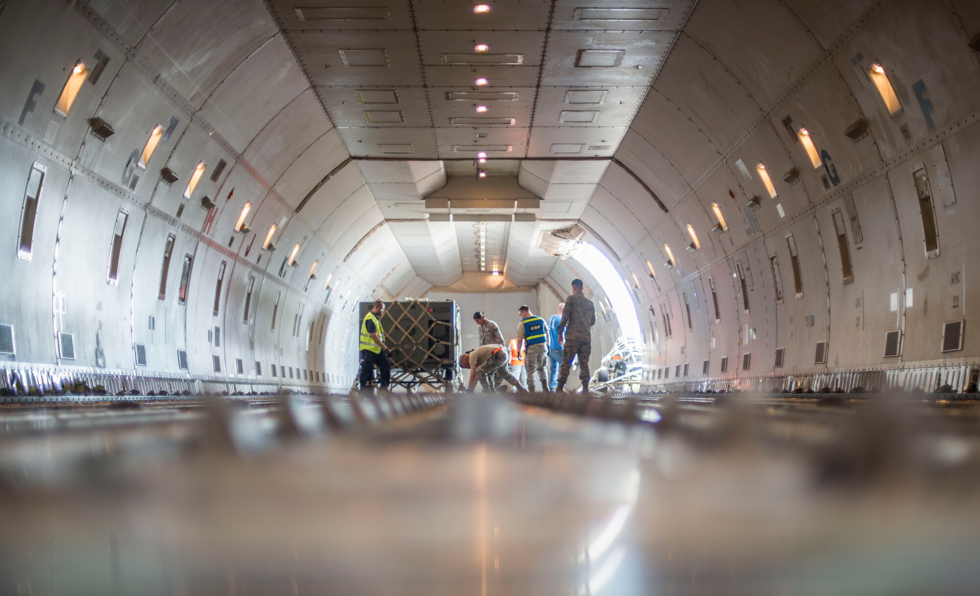 U.S. Air Force Airmen from the 35th Logistics Readiness Squadron load cargo onto a Boeing 747 at Misawa Air Base, Japan, July 17, 2016. The Airmen loaded more than 461,000 pounds of cargo for Exercise Pitch Black, a three-week multi-national large force employment exercise being conducted from Royal Australian Air Force Base Darwin and RAAF Base Tindal from July 29 to Aug. 19, 2016. (U.S. Air Force photo by Senior Airman Brittany A. Chase)