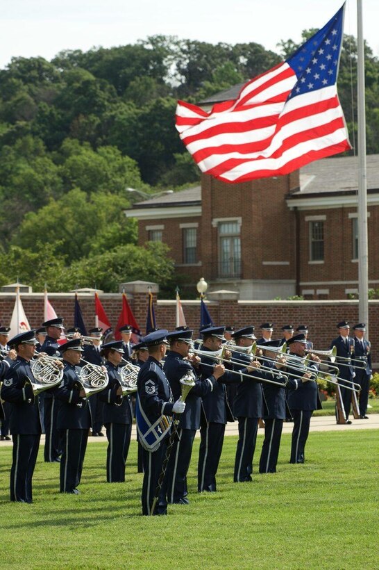 The Air Force Band Ceremonial Brass perform for the 11th Wing Change of Command ceremony on 12 July 2016 on Joint Base Anacostia-Bolling. (US Air Force Photo by Chief Master Sgt Bob Kamholz/released)