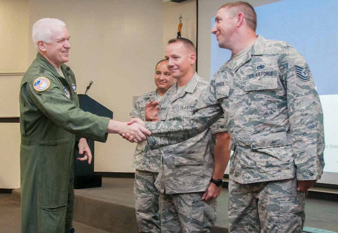 Lt. Gen. L. Scott Rice, director of the Air National Guard, greets 162nd Wing Airmen during a visit to the Arizona Air National Guard base at Tucson International Airport, June 29-30.  The visit is Rice’s first since becoming director. He met with Airmen and recognized outstanding accomplishments. (U.S. Air National Guard photo by 1st Lt. Lacey Roberts)