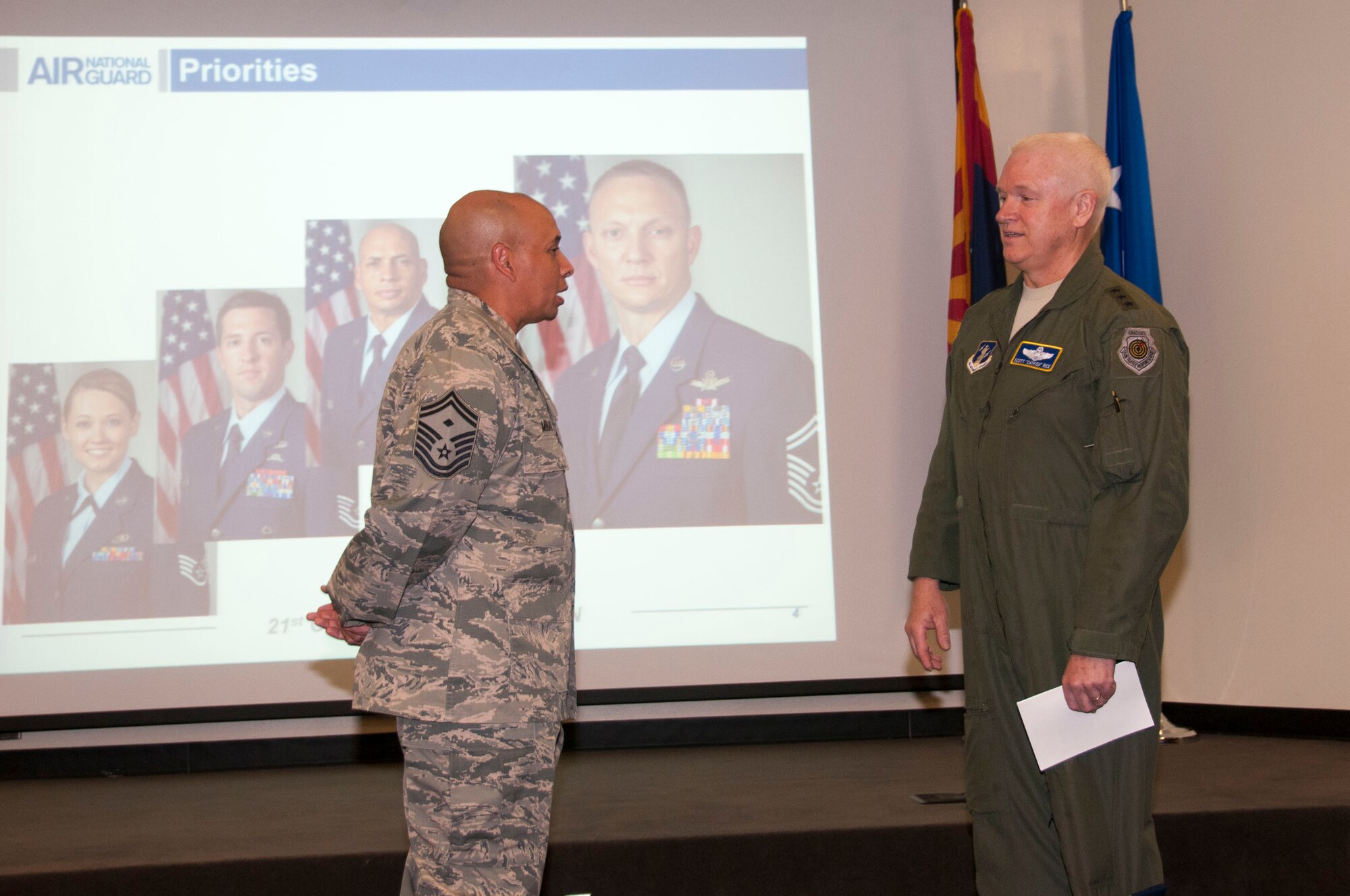 Lt. Gen. L. Scott Rice, director of the Air National Guard, recognized Senior Master Sgt. Jack Minaya, a first sergeant with the 162nd Wing’s 214th Reconnaissance Group and one of the 2016 outstanding Airmen during a visit to the Arizona Air National Guard base at Tucson International Airport, June 29-30.  The visit is Rice’s first since becoming director. (U.S. Air National Guard photo by 1st Lt. Lacey Roberts)