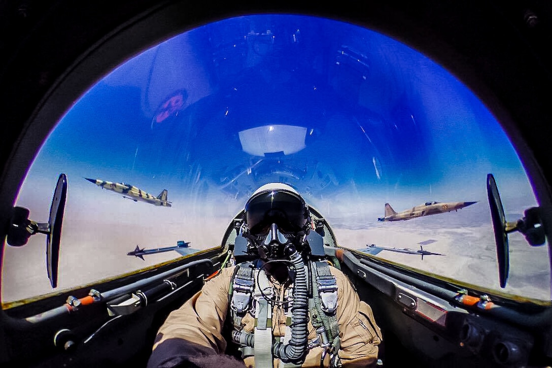 Marine Corps Lt. Col. William Sheridan pilots a F-5N above Marine Corps Air Station Yuma, Ariz., July 15, 2016. Sheridan commands the Marine Fighter Training Squadron 401, which is the Marine Corps' only adversary squadron. Marine fighter pilots man the squadron with each averaging well more than 2,500 flight hours in tactical fighter aircraft. Marine Corps photo by Cpl. Conner Robbins