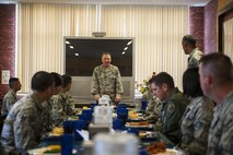 U.S. Air Force Lt. Gen. John Dolan, U.S. Forces Japan and 5th Air Force commander, speaks with members of the 18th Wing during an event June 28, 2016, at Kadena Air Base, Japan. Dolan discussed many topics including the SOFA agreement between the United States of America and Japan, and also used the visit as an opportunity to highlight exceptional performers from across the wing. (U.S. Air Force photo by Airman 1st Class Corey M. Pettis)
