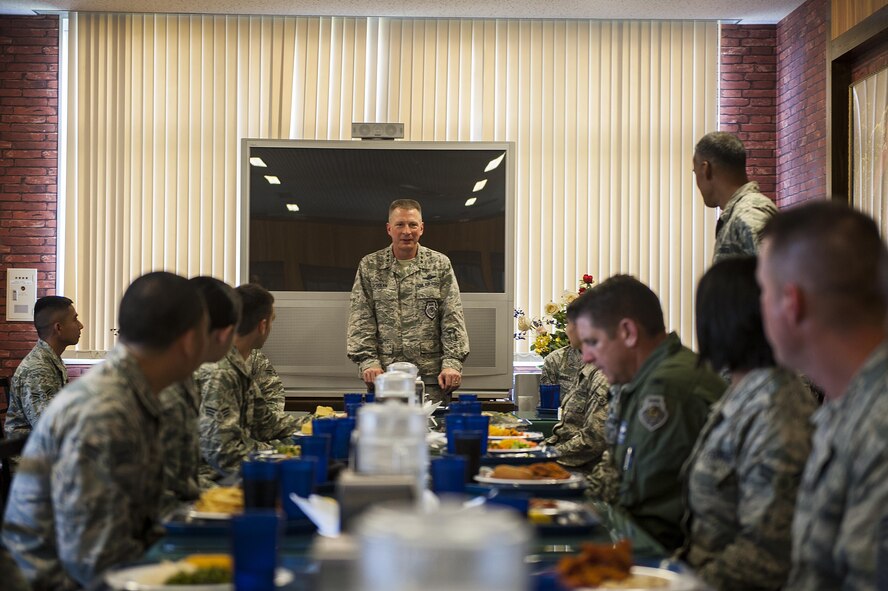 U.S. Air Force Lt. Gen. John Dolan, U.S. Forces Japan and 5th Air Force commander, speaks with members of the 18th Wing during an event June 28, 2016, at Kadena Air Base, Japan. Dolan discussed many topics including the SOFA agreement between the United States of America and Japan, and also used the visit as an opportunity to highlight exceptional performers from across the wing. (U.S. Air Force photo by Airman 1st Class Corey M. Pettis)
