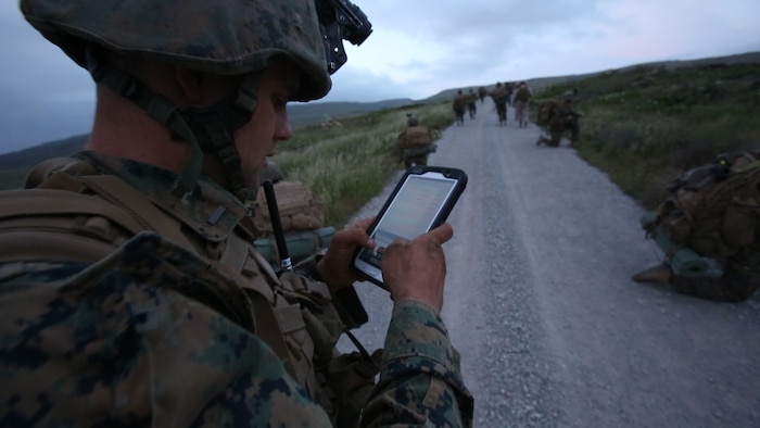 The MAGTF Common Handheld program will allow Marines to securely use modern handheld communications devices like tablets and smartphones in tactical environments to make more informed decisions on the go. Marine Corps Systems Command partnered with the National Security Agency’s Commercial Solutions for Classified program to address the unique security considerations inherent in using commercial products for tactical purposes. (U.S. Marine Corps photo by Pfc. Tyler W. Stewart) 