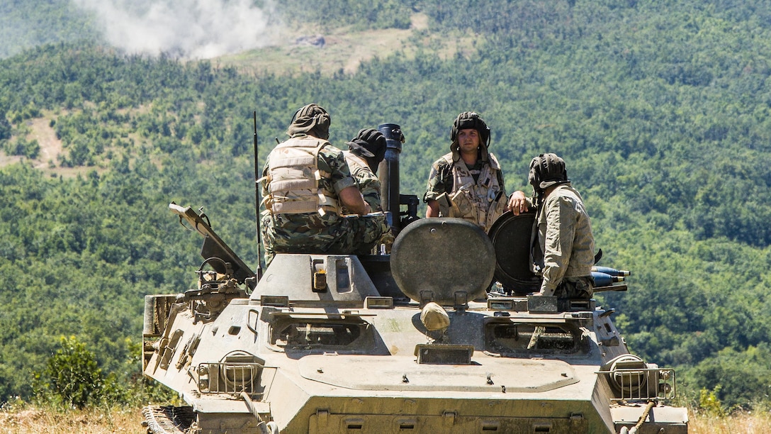 Bulgarian forces watch mortar rounds hit a target area from a BMP-23 infantry fighting vehicle during Exercise Platinum Lion 16-4 at Novo Selo Training Area, Bulgaria, July 13, 2016. This multi-national exercise brings together eight NATO and partner nations for a live-fire exercise aimed to strengthen regional defense in Eastern Europe.