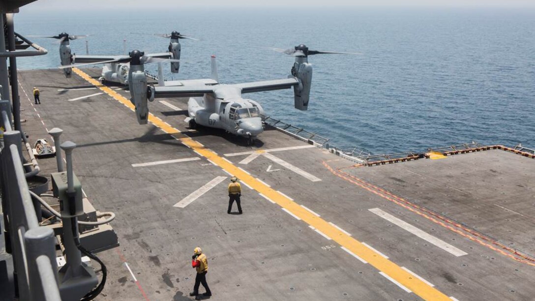 The 13th Marine Expeditionary Unit hosted flight deck landing qualifications for Special Purpose Marine Air Ground Task Force-Crisis Response-Central Command MV-22's, demonstrating interoperability between Navy and Marine Corps units. Two MV-22 Osprey from VMM-363, SPMAGTF-CR-CC, landed on the deck of the amphibious assault ship USS Boxer, July 7, 2016. The Boxer is currently in support of the 13th MEU operating in and around the Central Command area of responsibility. SPMAGTF-CR-CC is forward deployed in several host nations, with the ability to respond, rapidly, to a variety of contingencies