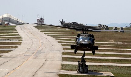 A UH-60 Black Hawk flight crew from Multinational Battle Group-East's Task Force Redhawk, sling loads supplies from Camp Bondsteel, Kosovo to Gjakova, Kosovo during Operation Poseidon July 15, 2016. U.S. and NATO forces have contributed to the United Nations-mandated peacekeeping mission in Kosovo since June 1999. 