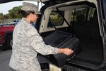 2nd Lt. Avery Larkin, 502nd public affairs officer secures her belongings July 13, 2016 on Joint Base San Antonio-Randolph. Ensuring a safe vacation starts at the beginning, when valuables should be placed in secure locations and kept out of sight for the duration of the trip.