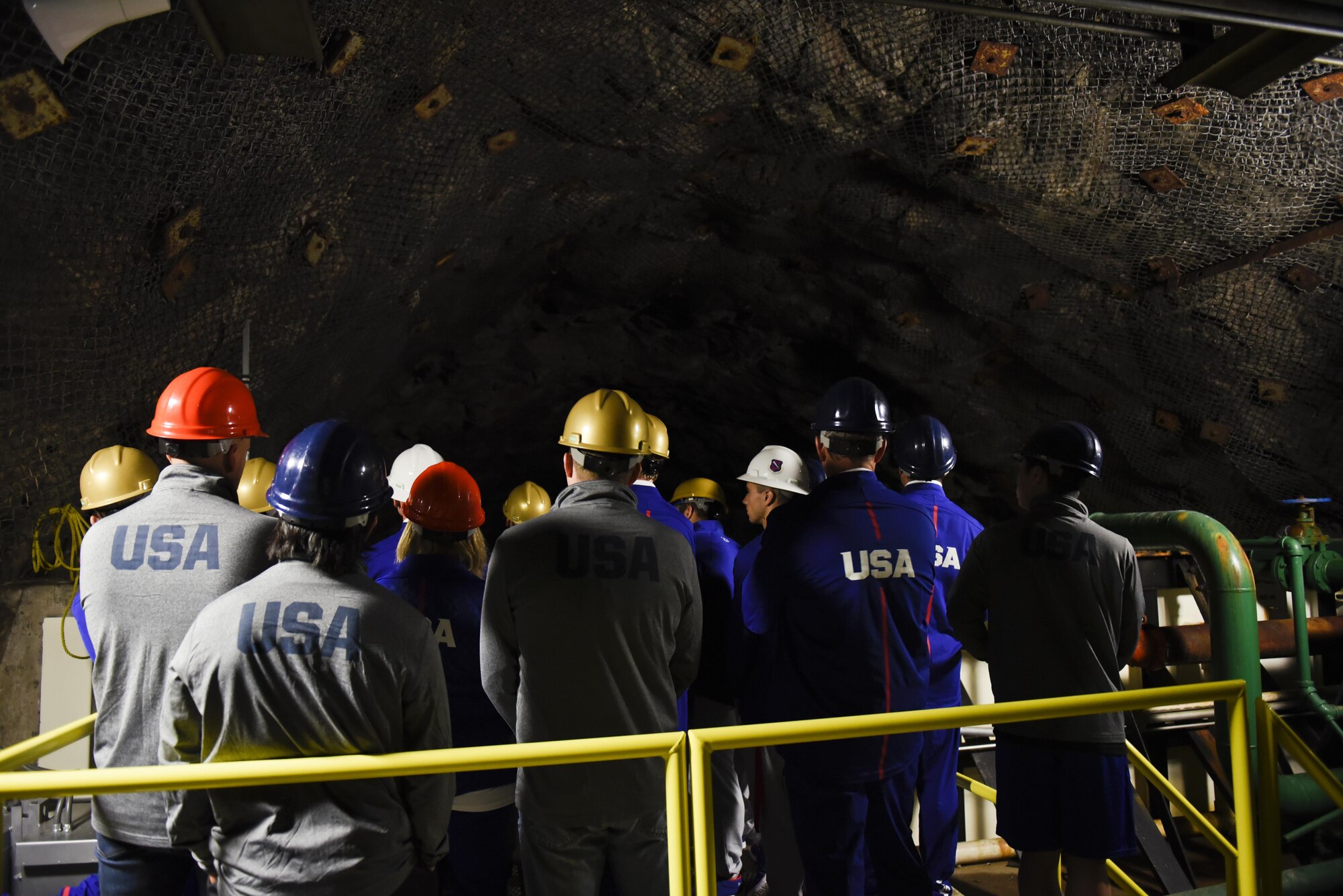 CHEYENNE MOUNTAIN AIR FORCE STATION, Colo. – Members of the U.S. Men’s Olympic Gymnastics Team take in the view of one of the underground lakes inside the facility at Cheyenne Mountain Air Force Station, Colo., July 14, 2016. The team got a tour of the facilities and learned about the mission before they prepare to go to Rio for the Summer Olympics. (U.S. Air Force photo by Senior Airman Rose Gudex)