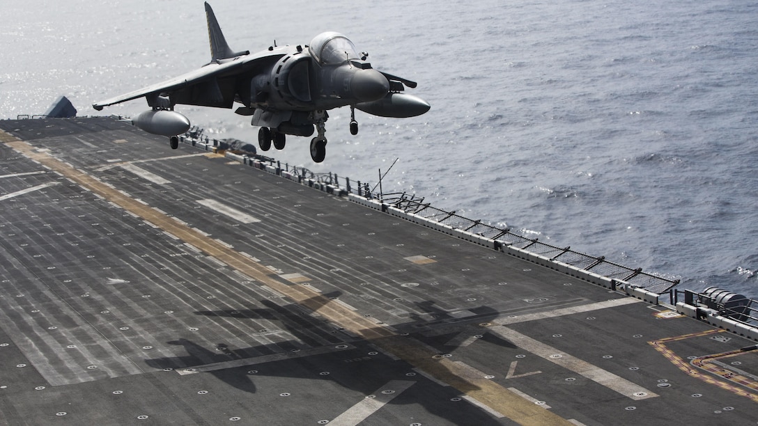 An AV-8B Harrier II with Marine Medium Tiltrotor Squadron 264, 22nd Marine Expeditionary Unit, lands on the flight deck of the amphibious assault ship USS Wasp on July 18, 2016. The 22nd Marine Expeditionary Unit, deployed with the Wasp Amphibious Ready Group, is conducting naval operations in support of U.S. national security interests in Europe.