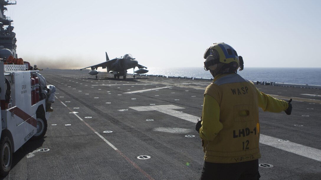 An AV-8B Harrier II with Marine Medium Tiltrotor Squadron 264, 22nd Marine Expeditionary Unit, takes off from the flight deck of the amphibious assault ship USS Wasp on July 18, 2016. The 22nd Marine Expeditionary Unit, deployed with the Wasp Amphibious Ready Group, is conducting naval operations in support of U.S. national security interests in Europe. 