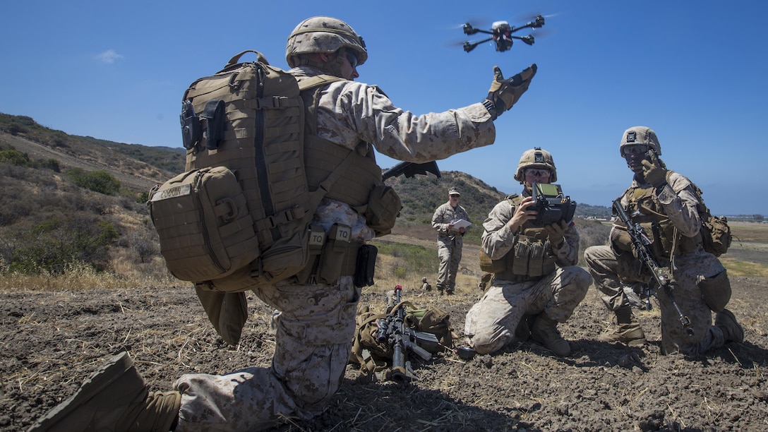 U.S.  Marine Lance Cpl. Benjamin Cartwright, an infantry Marine  with Kilo Company, 3rd Battalion 5th Marine Regiment, launches the Instant Eye MK-2 Gen 3 unmanned aerial system during an exercise for Marine Corps Warfighting Laboratory's Marine Air-Ground Task Force Integrated Experiment on Marine Corps Base Camp Pendleton, California, July 9, 2016. The Warfighting Lab is conducting an experiment in conjunction with the Rim of the Pacific exercise to explore new gear and assess its capabilities for potential future use. The Warfighting Lab identifies possible challenges of the future, develops new warfighting concepts, and tests new ideas to help develop equipment that meets the challenges of the future operating environment.