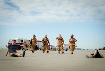 Emergency response personnel assigned to Minot Air Force Base conducted a Major Accident Response Exercise July 15, 2016, in preparation for the upcoming Northern Neighbor’s Day Air Show scheduled for August 13. The training exercise simulated a UH-1N Huey accident with varying levels of injuries. Personnel conducted the drill to ensure they are ready for any aircraft emergencies. (U.S. Air Force photos/Senior Airman Apryl Hall/Senior Airman Sahara Fales)