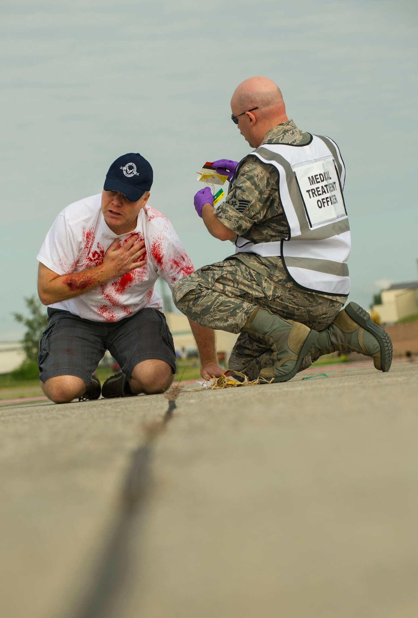 Emergency response personnel assigned to Minot Air Force Base conducted a Major Accident Response Exercise July 15, 2016, in preparation for the upcoming Northern Neighbor’s Day Air Show scheduled for August 13. The training exercise simulated a UH-1N Huey accident with varying levels of injuries. Personnel conducted the drill to ensure they are ready for any aircraft emergencies. (U.S. Air Force photos/Senior Airman Apryl Hall/Senior Airman Sahara Fales)