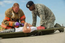 Emergency response personnel assigned to Minot Air Force Base conducted a Major Accident Response Exercise July 15, 2016, in preparation for the upcoming Northern Neighbor’s Day Air Show scheduled for August 13. The training exercise simulated a UH-1N Huey accident with varying levels of injuries. Personnel conducted the drill to ensure they are ready for any aircraft emergencies. (U.S. Air Force photos/Senior Airman Apryl Hall/Senior Airman Sahara Fales)
