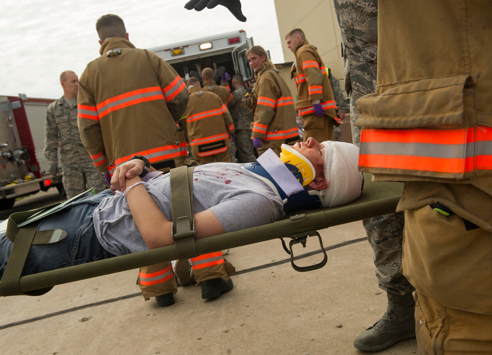 Emergency response personnel assigned to Minot Air Force Base conducted a Major Accident Response Exercise July 15, 2016, in preparation for the upcoming Northern Neighbor’s Day Air Show scheduled for August 13. The training exercise simulated a UH-1N Huey accident with varying levels of injuries. Personnel conducted the drill to ensure they are ready for any aircraft emergencies. (U.S. Air Force photos/Senior Airman Apryl Hall/Senior Airman Sahara Fales)