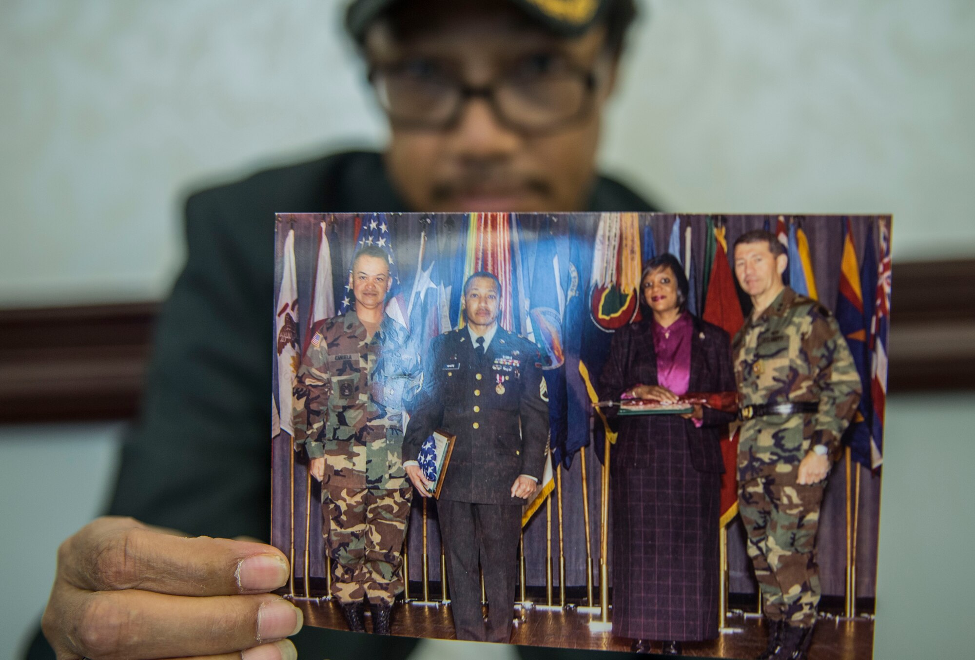 54-year-old Lavor D. White Sr., a former Army medic who served for 23 years, attends the transition summit after being out of work for over a decade due to injuries suffered while serving in the military, including a helicopter crash, an air assault accident, and a 250 ft. fall.  He brought his binder that holds all of his training certificates and important memories during his military career.  "I am willing to try anything," White said.  "I just want to get off the couch and live again." The first day of the transition summit offered industry briefs from Microsoft, the 375th Communications Group, Alcoa, Fastport, and SSM Health to transitioning service members, veterans, and military spouses, followed by a panel discussion with senior leaders of potential employers that answered questions of audience members on the transitioning process. The second day featured employment workshops, another panel discussion on different transition perspectives, and a hiring and education fair.   (U.S. Air Force photo by Staff Sgt. Jodi Martinez/Released)