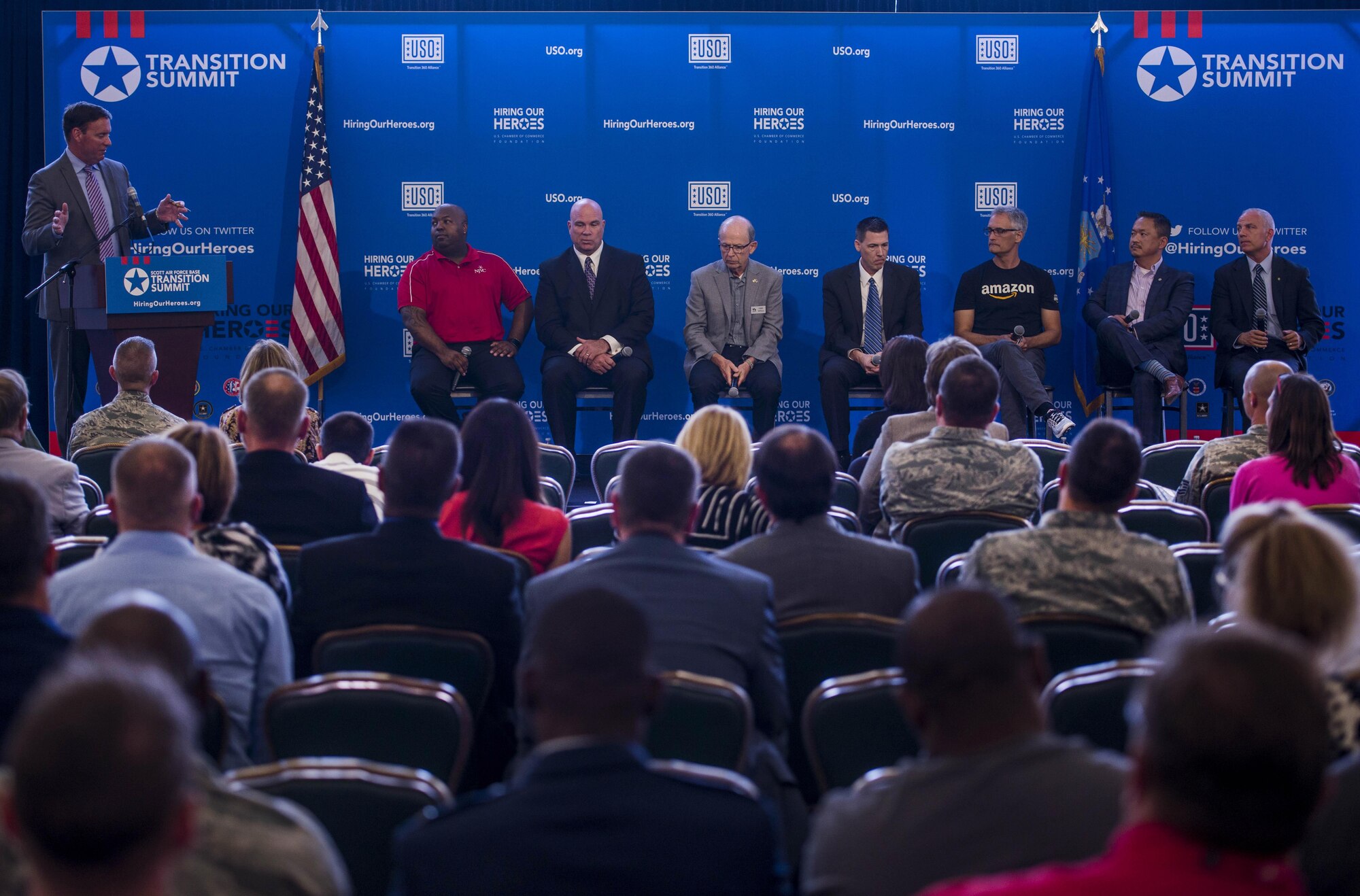 A panel answers questions from the audience during a two-day transition summit and hiring and education fair for transitioning members, veterans, and spouses, Scott Air Force Base, Ill., July 12, 2016. The transition summit offered industry briefs from Microsoft, the 375th Communications Group, Alcoa, Fastport, and SSM Health to transitioning service members, veterans, and military spouses, followed by a panel discussion with senior leaders of potential employers that answered questions of audience members on the transitioning process. The second day featured employment workshops, another panel discussion on different transition perspectives, and a hiring and education fair.   (U.S. Air Force photo by Staff Sgt. Jodi Martinez/Released)