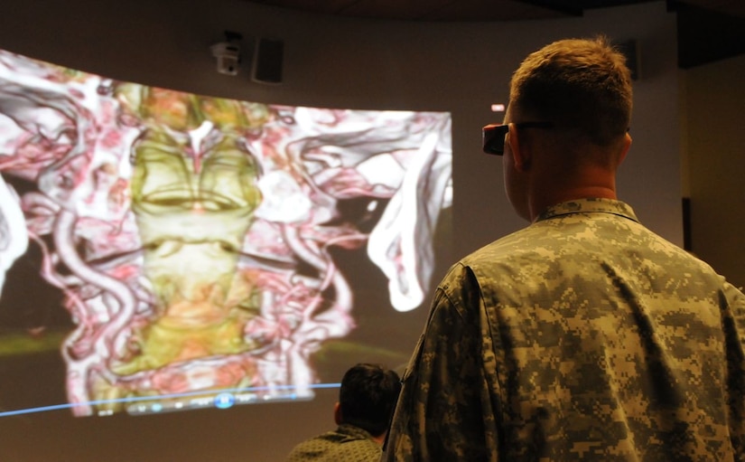 The National Intrepid Center of Excellence in Bethesda, Maryland features a digital imaging visualization environment, or DIVE, room that allows patients, clinicians and family members to view 3-D images of brain scans. Courtesy photo