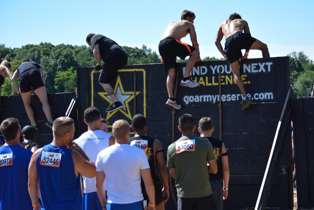 HUGO, Minn. -- Tough Mudder participants surmount the first challenge in the approximately 11-mile, military-style obstacle course held in Hugo, Minnesota July 16-17, 2016. The Army Reserve sponsors the events in an effort to strengthen its partnership with the local community, while fostering the resilience of Soldiers, Families, and Civilians.