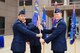 Col. Jason Janaros, 50th Mission Support Group commander, presents the guidon to Lt. Col. Andrew DeRosa during the 50th Civil Engineer Squadron change of command ceremony at Schriever Air Force Base, Colorado, Wednesday, July 20, 2016. DeRosa assumed command from Lt. Col. Nathan Clemmer. (U.S. Air Force photo/Dennis Rogers)