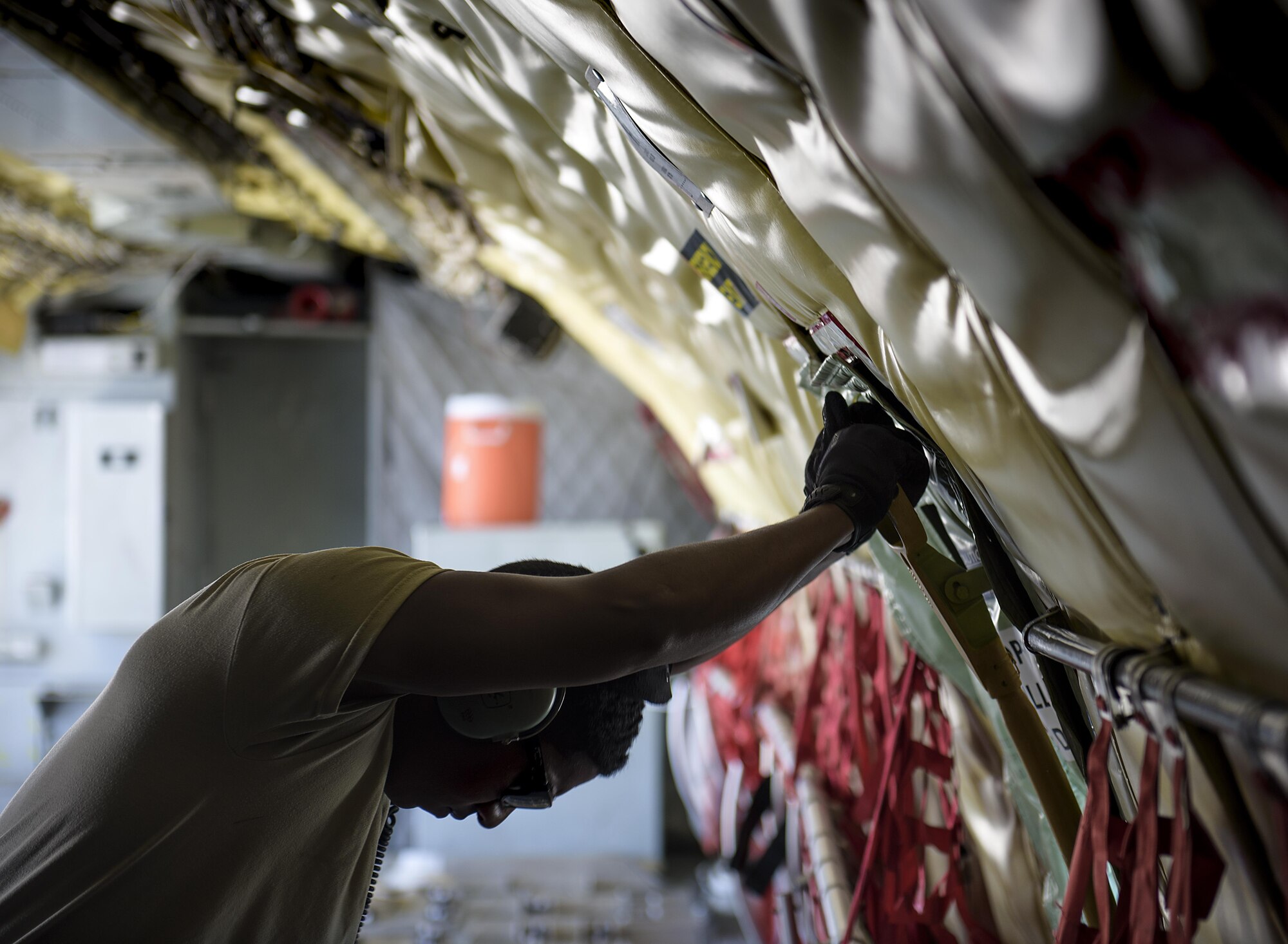 With outside temperatures in the low 100s, the temperature inside of a KC-135 Stratotanker reaches 120 with ease as it sits on the Nellis Air Force Base, Nevada flight line. The KC-135 Red Flag went on to refuel several aircraft during exercise Red Flag July 18, 2016. Red Flag 16-3 is one of four Red Flag exercises at Nellis--this edition of Red Flag focusing on multi-domain operations in air, space and cyberspace. (U.S. Air Force photo/Tech. Sgt. David Salanitri)