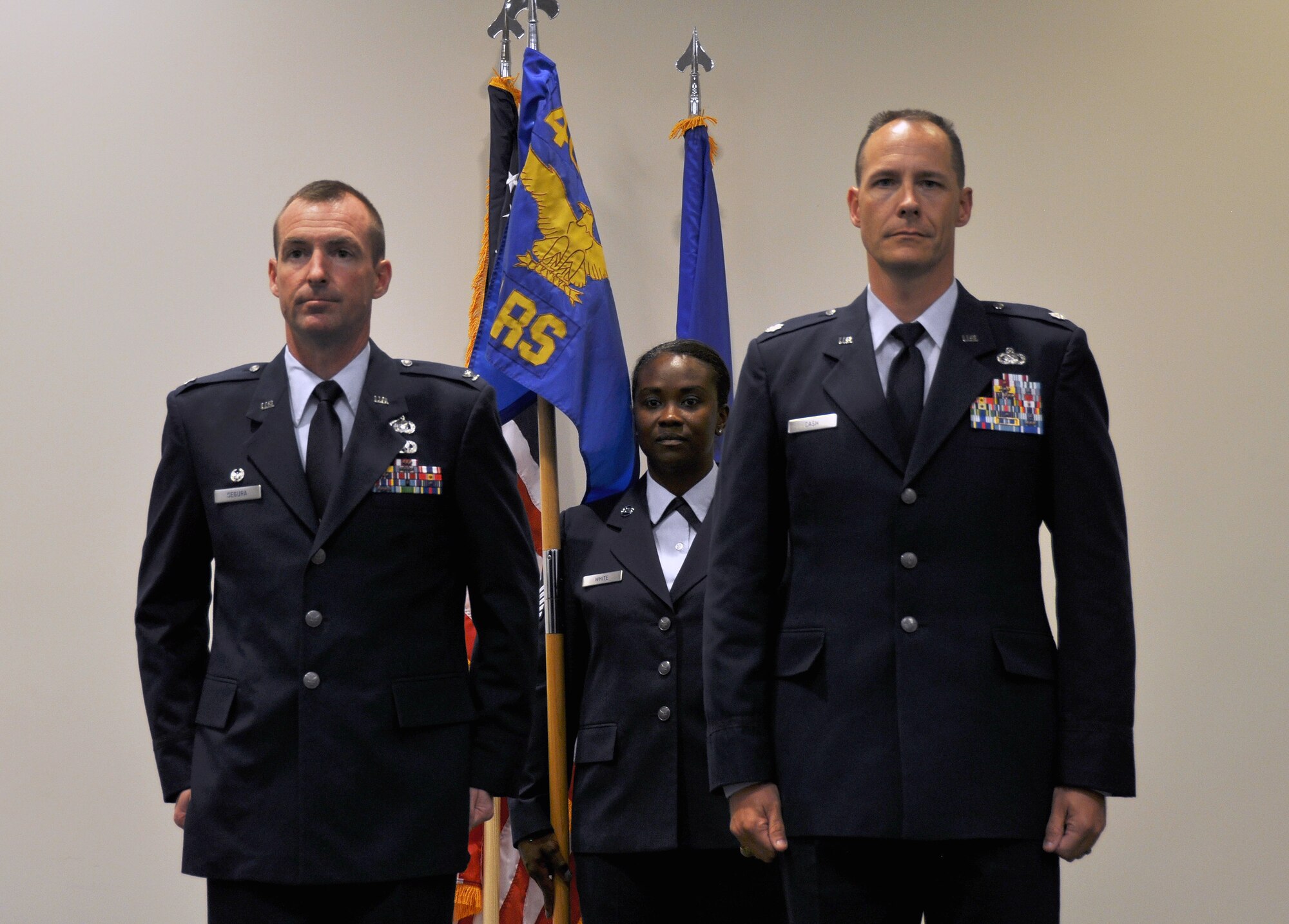 Lt. Col. Clinton Cash assumed command of the 403rd Logistics Readiness Squadron July 16, 2016, during a ceremony held in the Roberts Maintenance Facility Auditorium, Keesler Air Force Base, Mississippi. The flag of command was passed by Col. Edward Sagura, 403rd Mission Support Group commander. (U.S. Air Force photo/Master Sgt. Jessica L. Kendziorek)