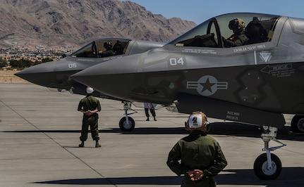 (July 12, 2016) - Marine F-35B aircrew members, assigned to the 3rd Marine Aircraft Wing, Marine Corps Air Station Yuma, Az., perform pre-flight checks and participate in Red Flag 16-3 at Nellis Air Force Base, Nev., July 12, 2016. Since its establishment in 1975, Red Flag has played host to military units from more than 30 countries to participate in high-end flight integration. 
