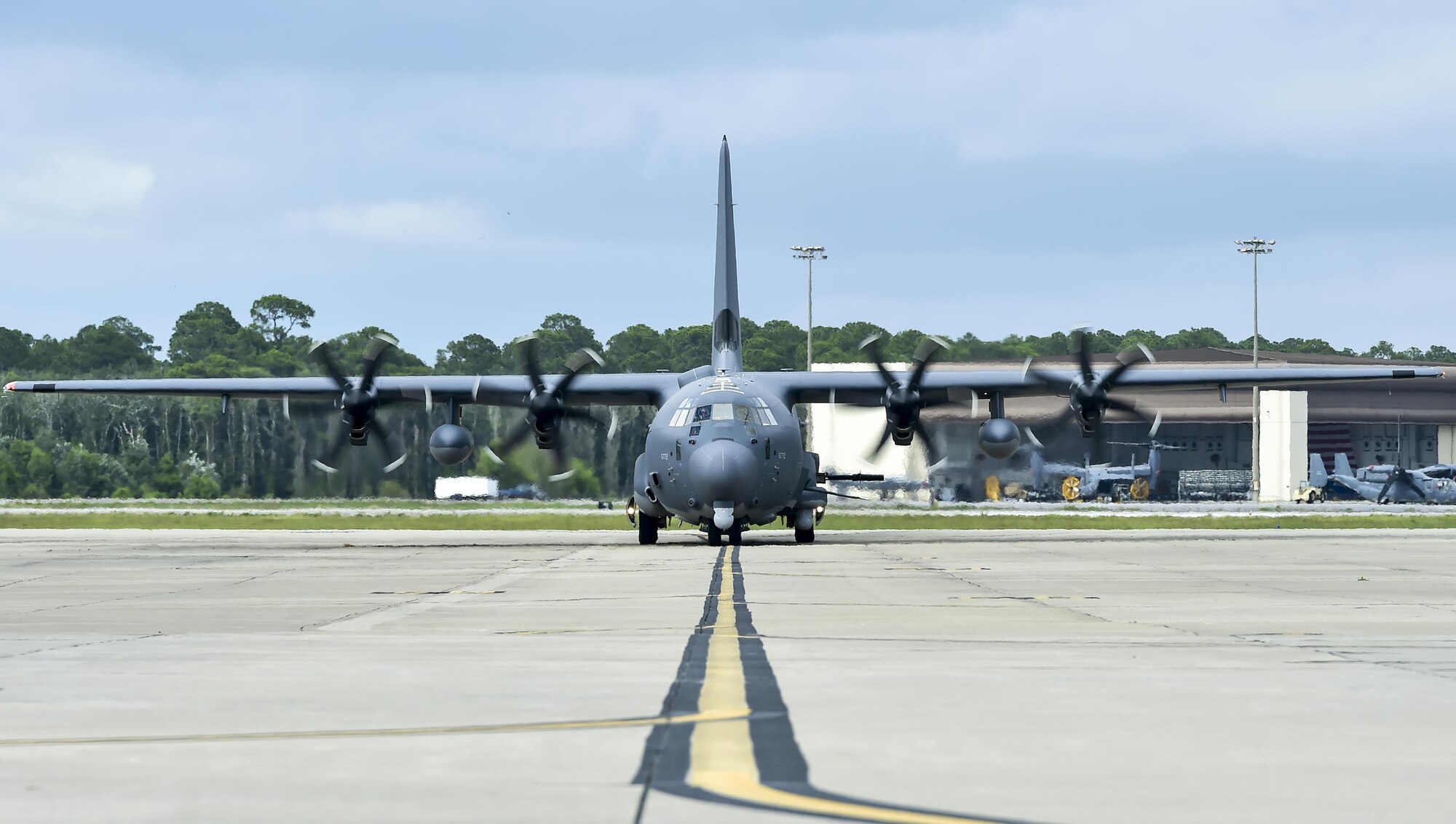 An AC-130J Ghostrider gunship, Block 20 model, arrives at Hurlburt Field, Fla., for the first time July 18, 2016. This aircraft is the first of 21 AC-130Js with the 105mm canon modification scheduled to be delivered here. The AC-130J Ghostrider's primary missions are close air support, air interdiction and armed reconnaissance. (U.S. Air Force photo by Senior Airman Jeff Parkinson)