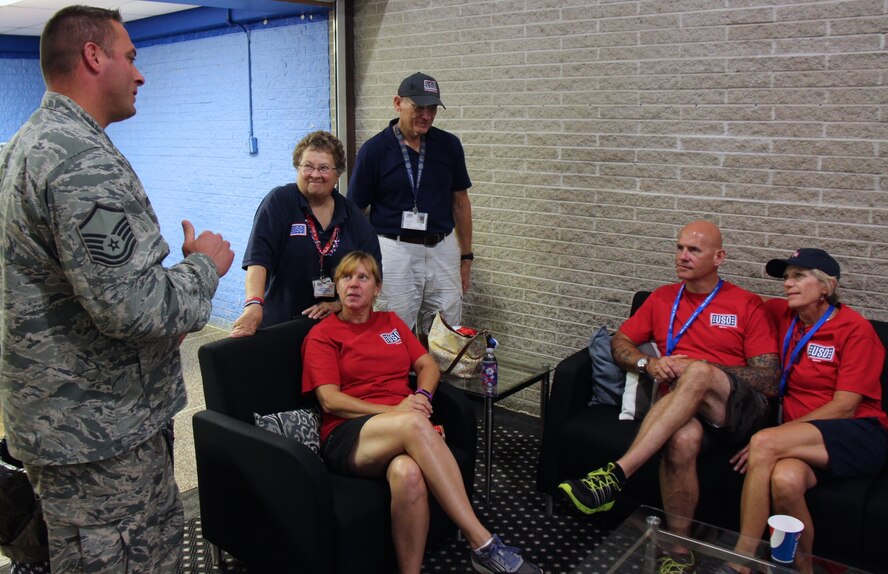 Master Sgt. Chad Bruntgens, 932nd Maintenance Group, takes a moment out during the busy July schedule at the 932nd Professional Development Course, to stop and thank the USO volunteers from Saint Louis that came out and fed Airmen of the 932nd Airlift Wing.  (U.S. Air Force photo by Maj. Stan Paregien