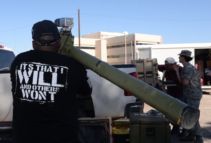 Tony Rankins, program manager for the Warfighter Integration Office at the Center for Countermeasures, aims a man-portable air-defense system (MANPADS) during Red Flag 16-3 on Nellis Air Force Base, Nev., July 18, 2016. MANPADS can attain a speed of about twice the speed of sound and strike aircraft flying at altitudes up to approximately 15,000 feet. The device is monitored through a separate computer which calculates the accuracy and trajectory. (U.S. Air Force photo by Senior Airman Kristin High/Released)