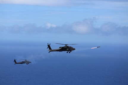 Two U.S. Army AH-64D Apache attack helicopters assigned to the 2-6 Cavalry Squadron, 25th Combat Aviation Brigade launch eight "fire and forget" AGM-114L Hellfire Air to Surface Missiles during a training exercise off the coast of Oahu as part of the Rim of the Pacific (RIMPAC) 2016. Exercise participants boosted their proficiency in tactics, targeting and live firing during a sinking exercise (SINKEX) with the decommissioned Pearl Harbor frigate USS Crommelin on July 19, 2016. 