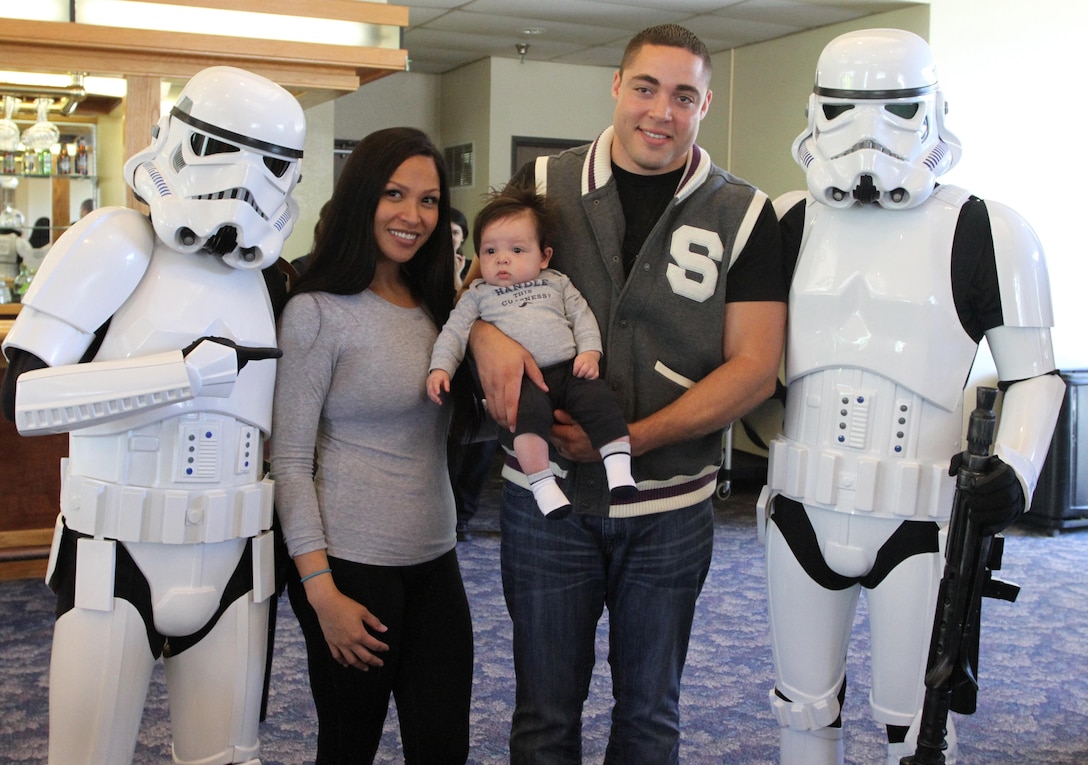 Star Wars Storm Troopers pose for a photo with Sgt. James J. Nieves and his family during Recruiting Station Los Angeles’ Family Day at Naval Base Ventura County Port Hueneme, July 16, 2016. During the family day, volunteers from the 501st Legion Southern California Garrison dressed up as Star Wars characters, interacting with families. (U.S. Marine Corps photo by Staff Sgt. Alicia R. Leaders/Released)