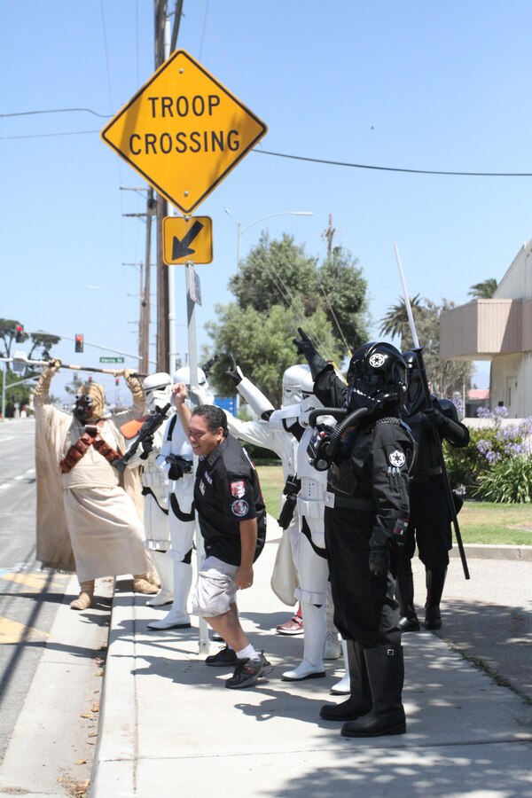 Star Wars characters walk around Naval Base Ventura County, interacting with pedestrians during Recruiting Station Los Angeles’ Family Day at Naval Base Ventura County Port Hueneme, July 16, 2016. Volunteers from the 501st Legion Southern California Garrison dressed up as Star Wars characters, interacting with families. (U.S. Marine Corps photo by Staff Sgt. Alicia R. Leaders/Released)