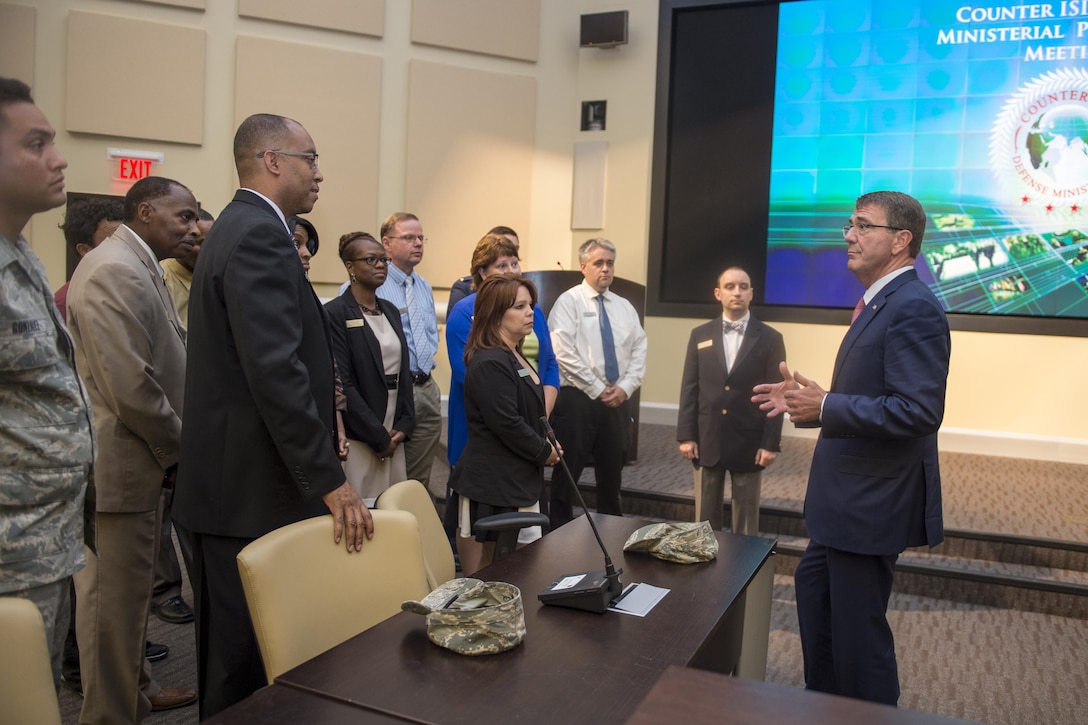 Defense Secretary Ash Carter, right, thanks support staff after a meeting with defense ministers and senior leaders from the coalition to counter the Islamic State of Iraq and the Levant at Joint Base Andrews, Md., July 20, 2016. DoD photo by Air Force Tech. Sgt. Brigitte N. Brantley