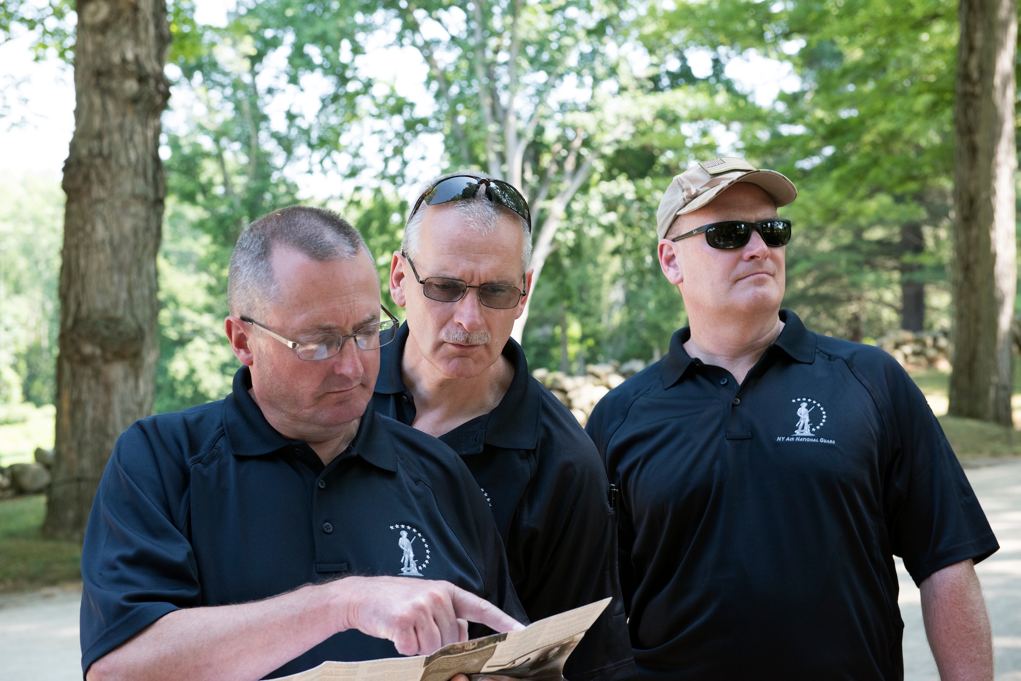 (From left) Chief Master Sgt. Raymond Morgan, Senior Master Sgt. Jeffrey Trottier and Lt. Col. William Carraher visit the Lexington and Concord battle road in Massachusetts on July 13, 2016. They were among more than 20 senior officer and enlisted leaders from the 109th Airlift Wing who participated in a professional development staff ride to Massachusetts July 11-14. Leaders had the opportunity to network with each other and discuss the wing's strategic plan. (U.S. Air National Guard photo by Senior Airman Jamie Spaulding/Released)