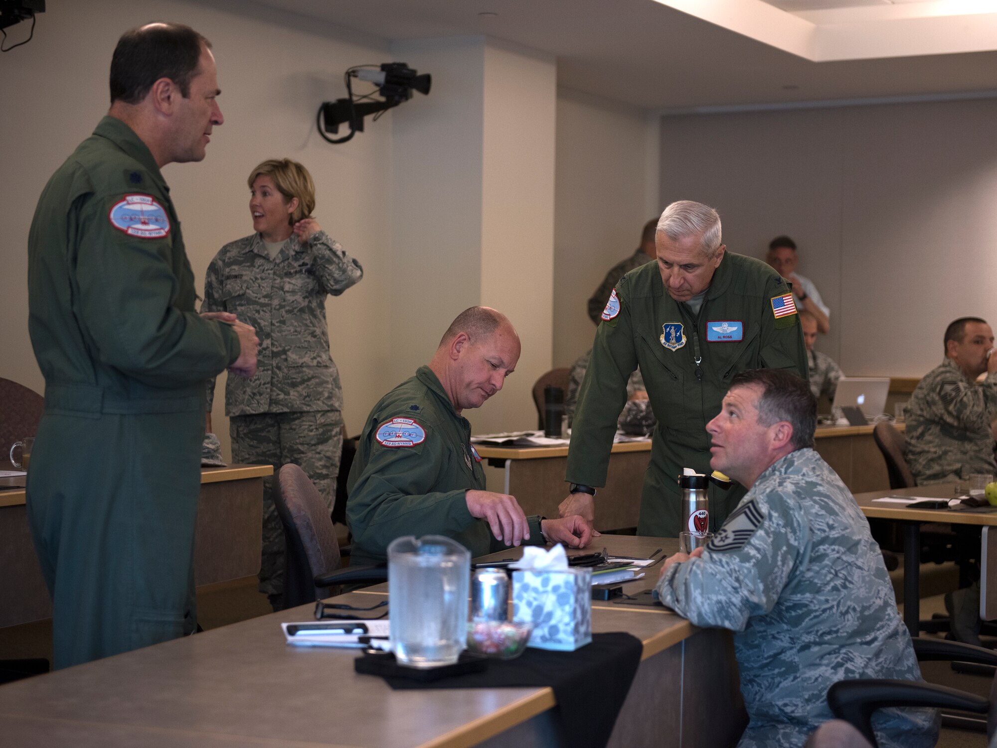(From left) Lt. Col. Christian Sander, Lt. Col. Clifford Souza, Col. Alan Ross and Chief Master Sgt. Joseph Cerniglia discuss the 109th Airlift Wing's strategic plan at the Southbridge Conference Center, Southbridge, Massachusetts, on July 12, 2016. More than 20 senior officer and enlisted leaders with the 109th AW participated in a professional development staff ride to Massachusetts July 11-14 and along with strategic plan discussion also had the opportunity to network with each other. (U.S. Air National Guard photo by Senior Airman Jamie Spaulding/Released)